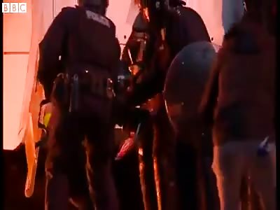 police catch fire in a protest