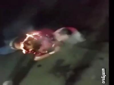 Man is Roasted over the Coals... Cooked