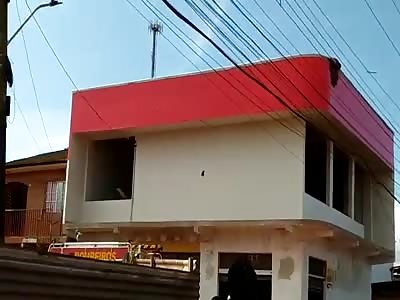 Damn the man jumps from the top of the house