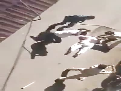 Fat man is hit with sticks