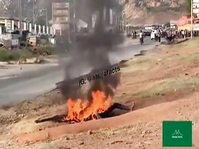 thief burned by angry mob