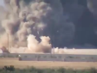 #Manbij SDF fighters destroying an ISIS vehicle in the countryside.