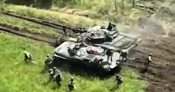 UA troops attack a ORC trench position