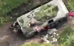 Drone-coordinated Excalibur artillery strike on a Russian BMP-2