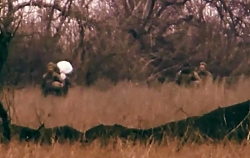 Walking Ukrainian Soldier Is Hit In the head by Russian Snipers.