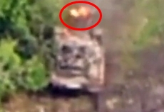 A ORC tank is hit by a kamikaze drone, ORC is on fire