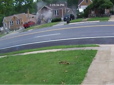 Car goes airborn and horrifically crashes into a house 