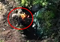 Drones drop grenades on ORCs positions, bodies on fire are seen...