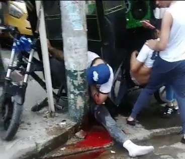 Horrific accident leaves man crushed dead to pole and one seriously in