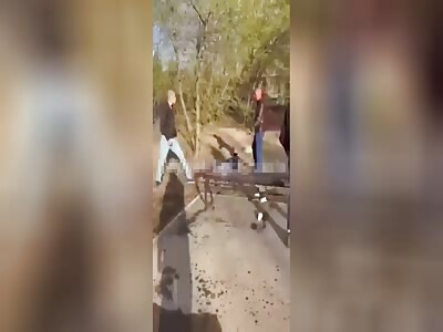 Russian Skinheads begin a beating on asian old men