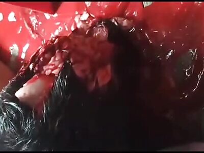 Young man killed by headshot his brain on the sidewalk 