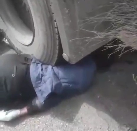 Motorcyclist crushed dead under trash truck 