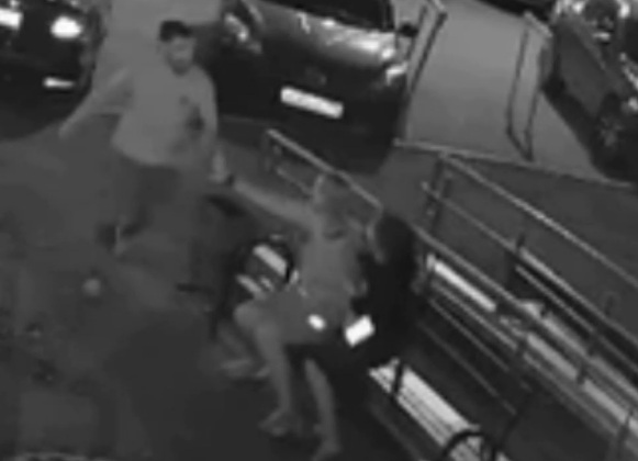 angry man beat a neighbor who was trying to protect his wife from him