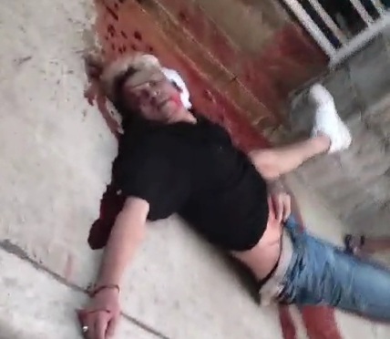 Cleaning the mess after young man executed by sicario