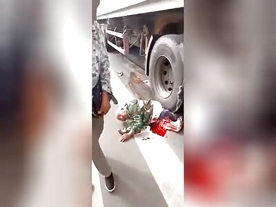 old man  is crushed by a truck and is still alive 