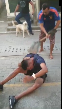 Thief is Kicked and Punched with a Trowel