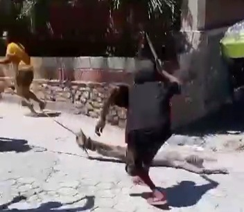Killed gang member dragged by motorcyclists in Haiti 