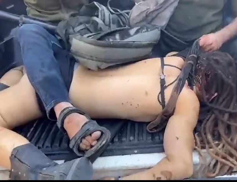 Palestinians Parading Young Israeli Girls Dead Body Through Street