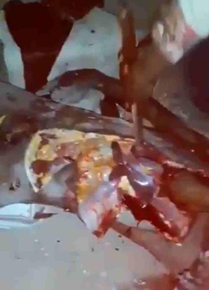 Haitians Carve Up A Man's Corpse Like It's A Side Of Beef