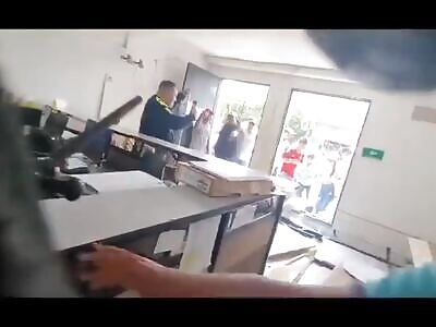 A Woman Dies in a Fire Caused During a riot.