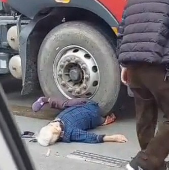poor lady was crushed under a truck wheel
