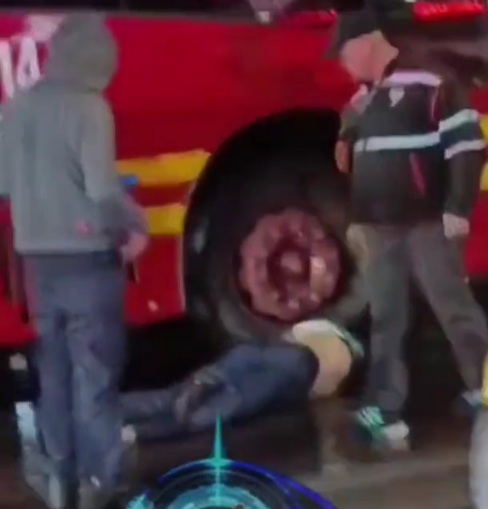 Two pedestrians crashed under bus