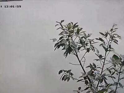 A brick truck overturned in India killing two and destroying a number