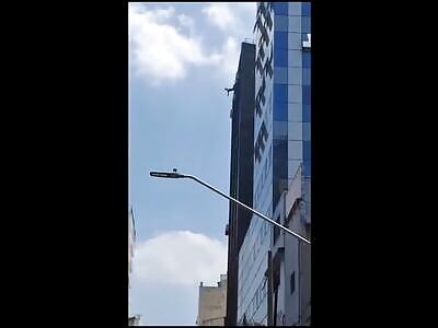 (different angles) man jumps to his death