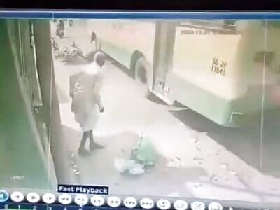 Crushing a person under the bus in India