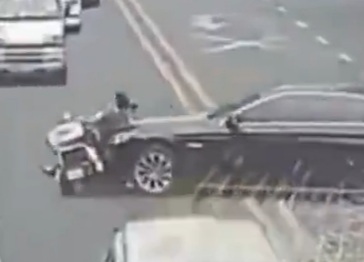 Girl on Moped Mopped on Pavement