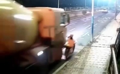 Chinese girl on moped crashed dead under cement truck 