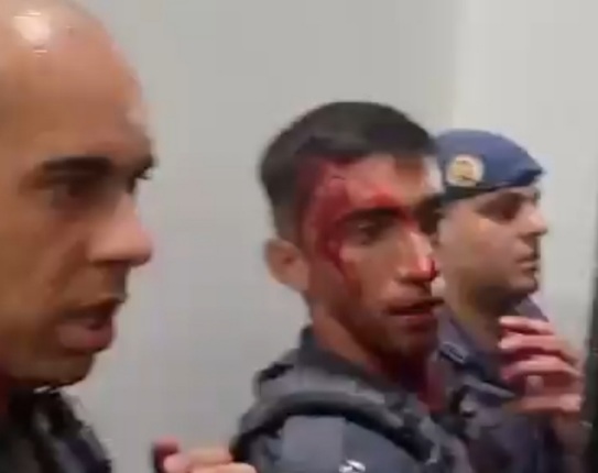 Two police officers wounded after confronting football fans 