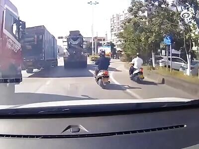 A bicycle was run over by a cement truck
