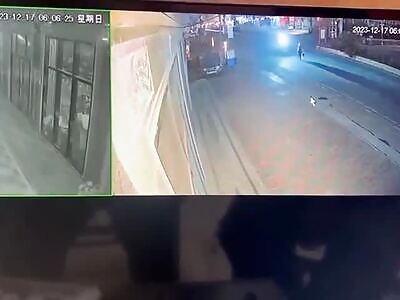 Woman gets knocked over, then gets run over and dragged down the road 