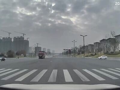 Motorcyclist Getting Hit By Firefighter Truck.China