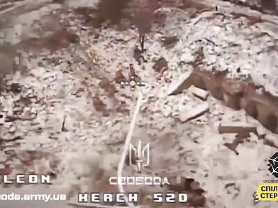 Direct hit by FPV drone on a bunch of Russians