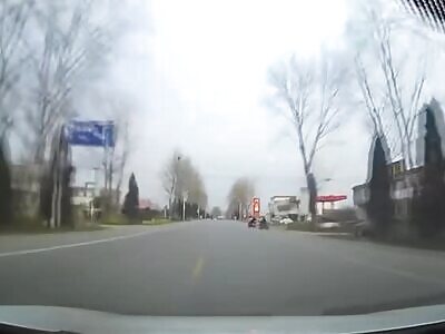 Couple on scooter get smashed by car. China, December 2023