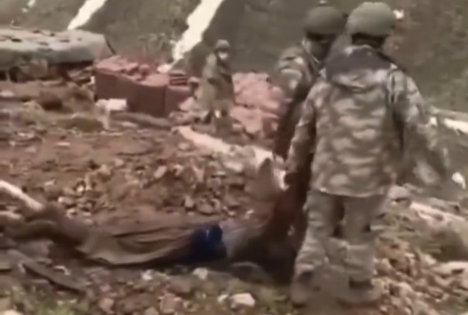 Another pkk fighter killed and dragged down the mountain 