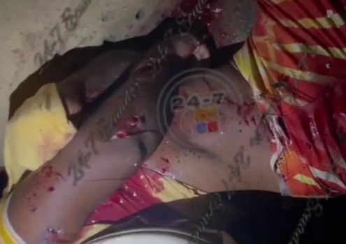 a male person was murdered inside a home with several bullet wounds 