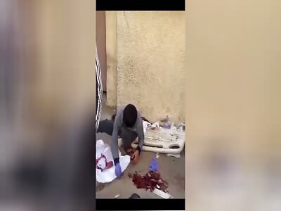 GAZA:  Kid is Picking up Parts of his Parents from the Ground.