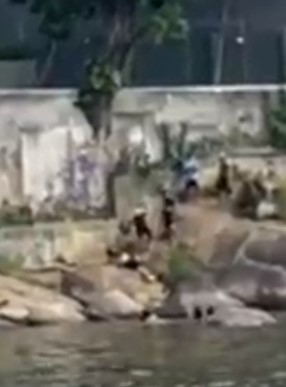 young man being executed is a beach in Vitória Brazil