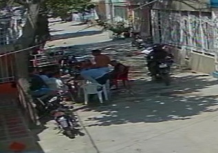Young man enjoying drink with his friends executed by sicario 