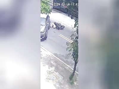 Biker Faceplants Straight into Car
