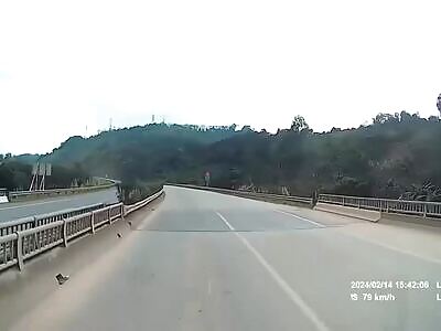 Runaway Biker Hits Car Head On