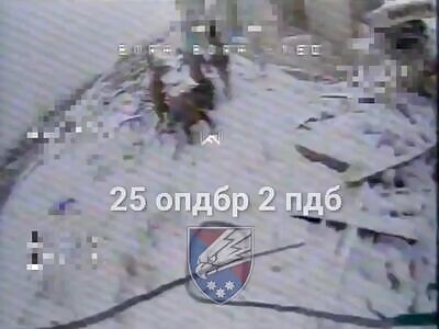 Russians carrying a wounded comrade were hit by FPV