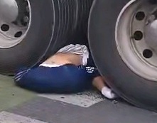 Motorcyclist crashed dead under big loaded truck 