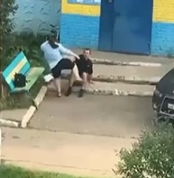 Woman beat husband in front of her son