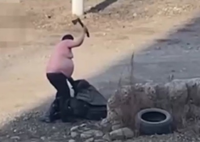 Half-Naked Man with an Axe and a Knife.