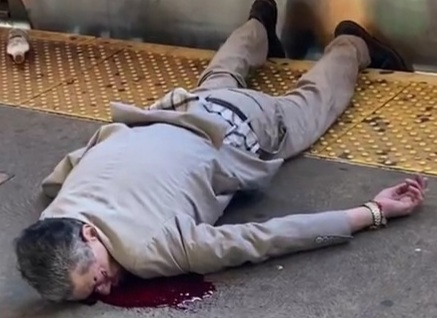 Old depressed man put his face in front of the oncoming train