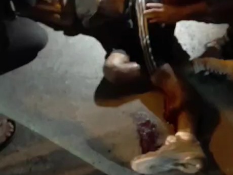 One dead after gang shooting in busy street 